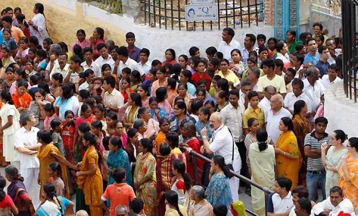 devotees offer prayers at sai baba s ashram brindavan