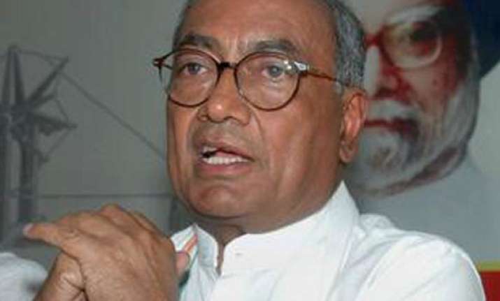 digvijay demands probe into ramdev s activities