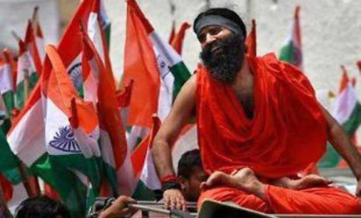 ed slaps notices against ramdev
