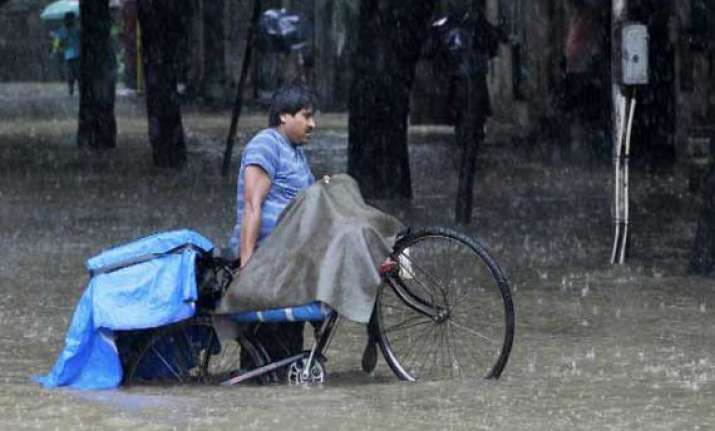four swept away in floodwaters