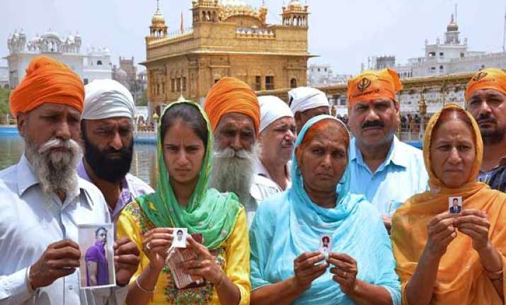from golden temple to delhi punjab families pray for iraq