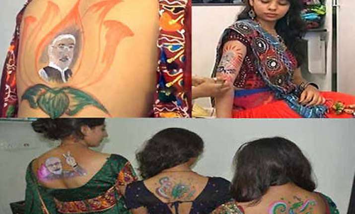 girls go for narendra modi tattoos during garba festival