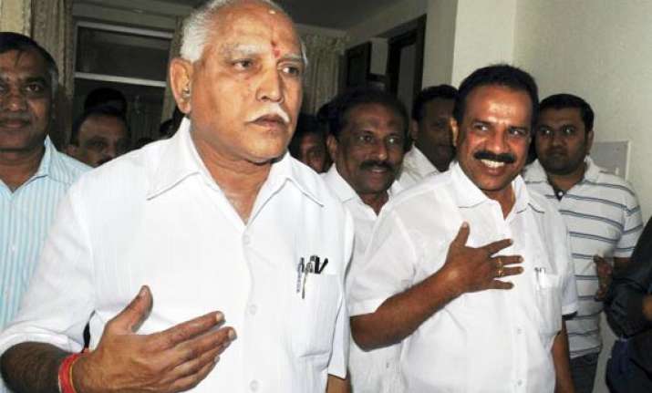 gowda gets a breather as yeddy breathes down gadkari s neck
