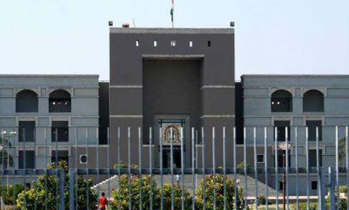 gujarat hc commutes death sentence in rape and murder case