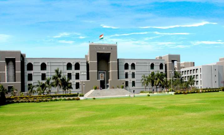 gujarat hc seeks state s reply on land allocation promise