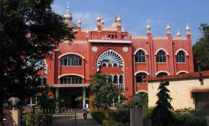 hc quashes g.o. reverting promotions of 12 tasmac employees