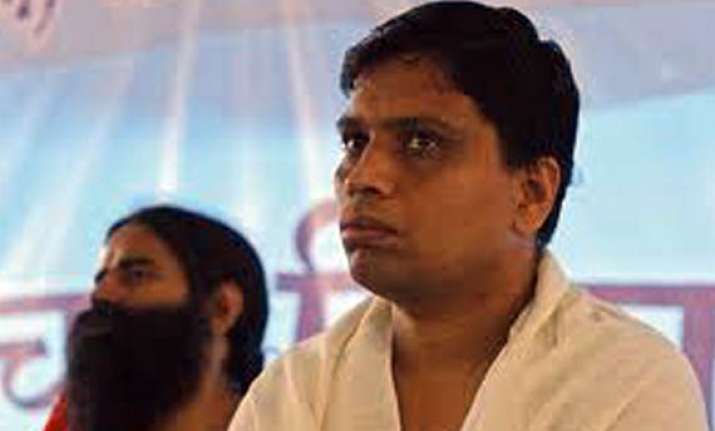 haridwar police pastes cbi summons outside balkrishna s