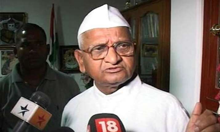 hazare oppn come under upa rjd fire