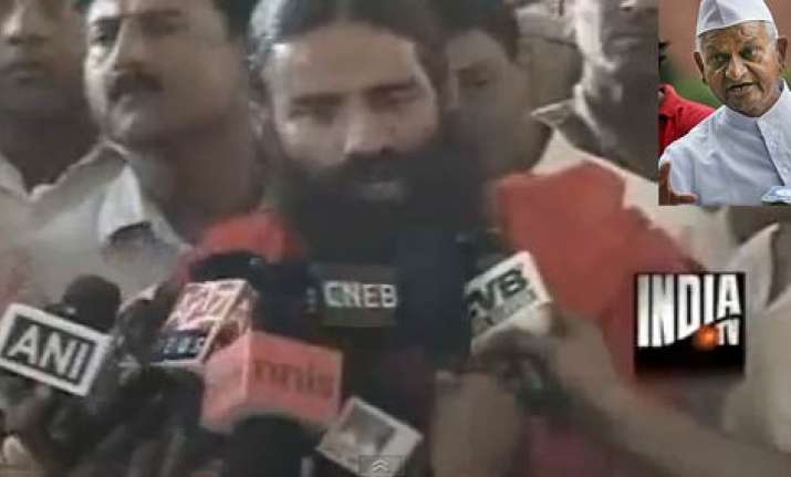 beware of govt s motive hazare warns ramdev