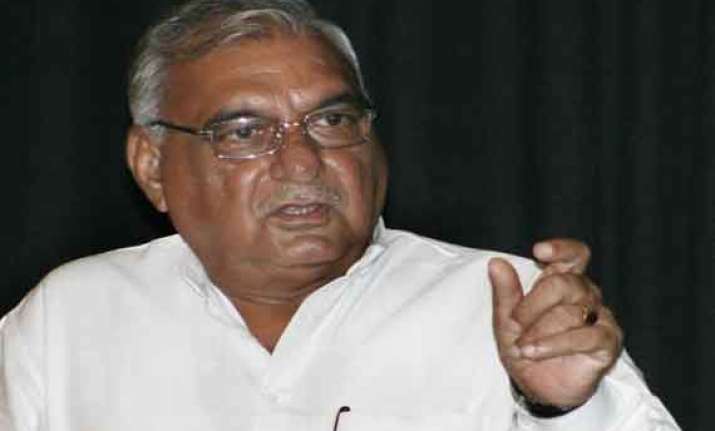 hooda equates khaps with ngos