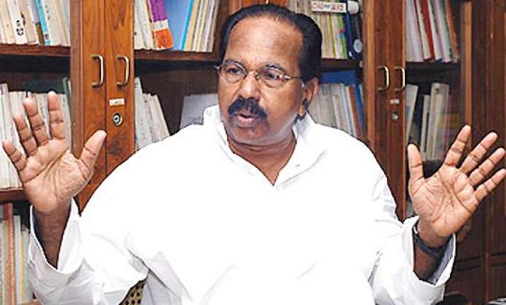 moily takes charge says he s happy with pm sonia
