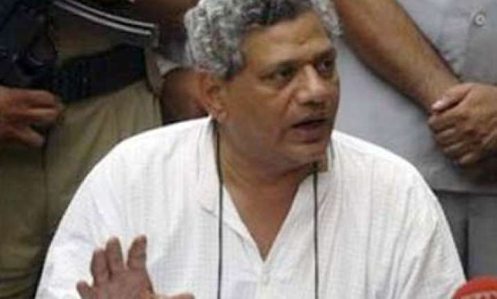 obama shakes hands with cpi m leader yechury