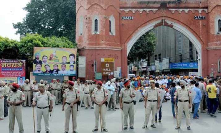 punjab remains on boil paramilitary forces stage flag