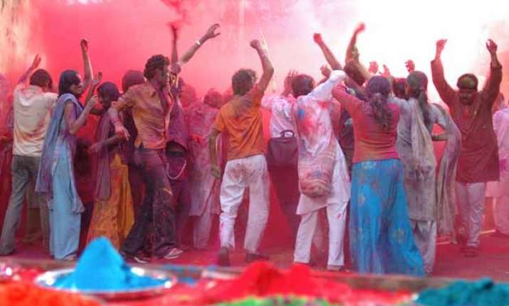 colours rule streets as people celebrate holi