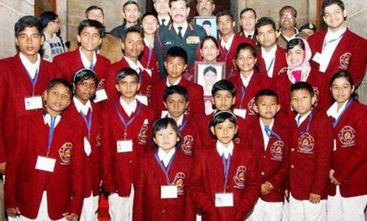 president gives national honours to 25 kids for bravery
