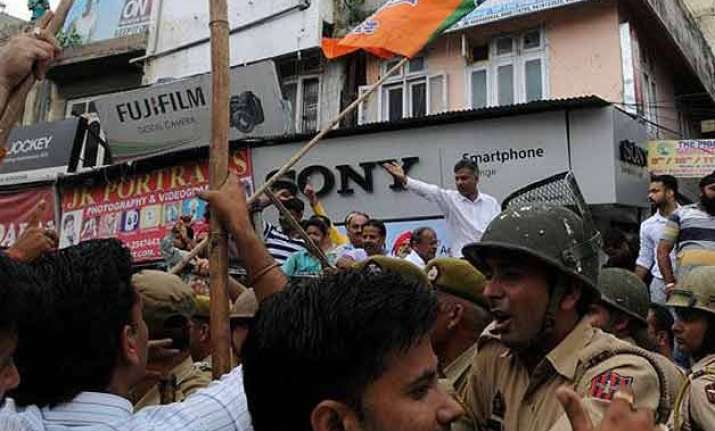 aiims row bjp acc activists clash as jammu observes