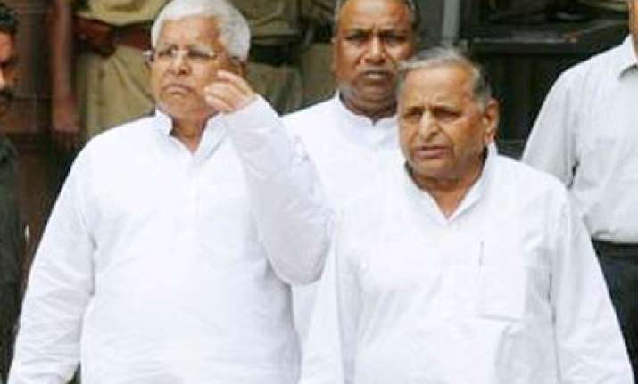 sp rjd announce withdrawal of support to upa govt