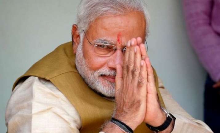 narendra modi delighted by obama s gift of book containing