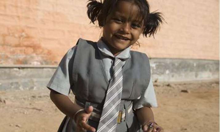 girl born with parasitic twin struggling for survival