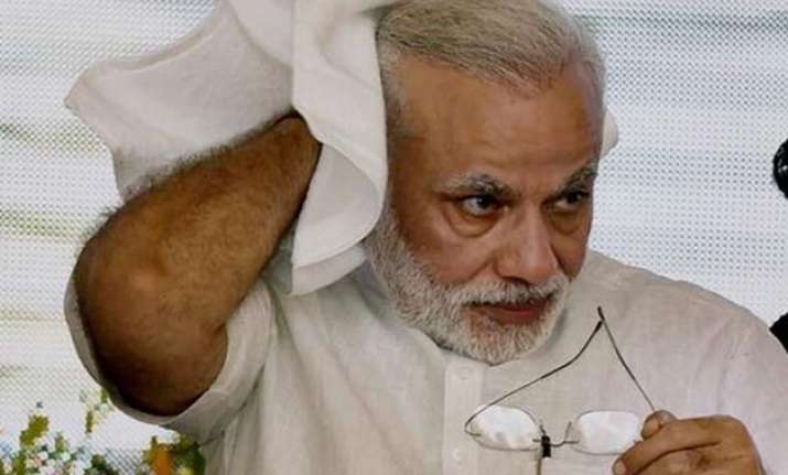 pm modi condemns attack on karachi bus