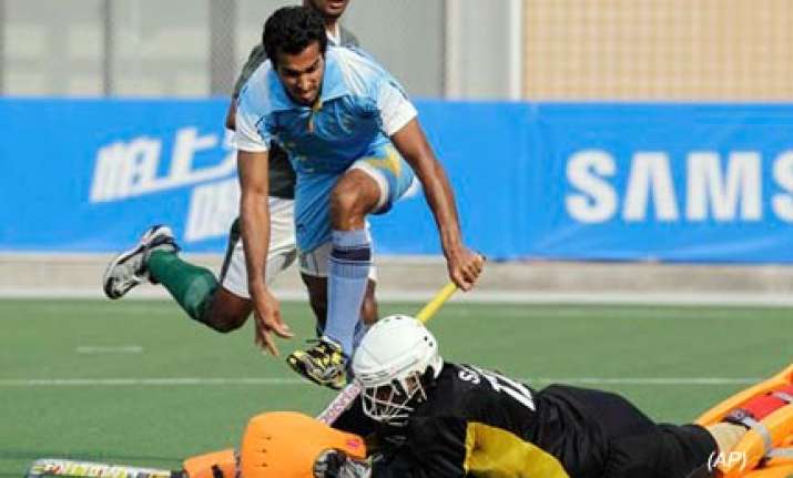 malaysia dash india s gold medal hopes in hockey