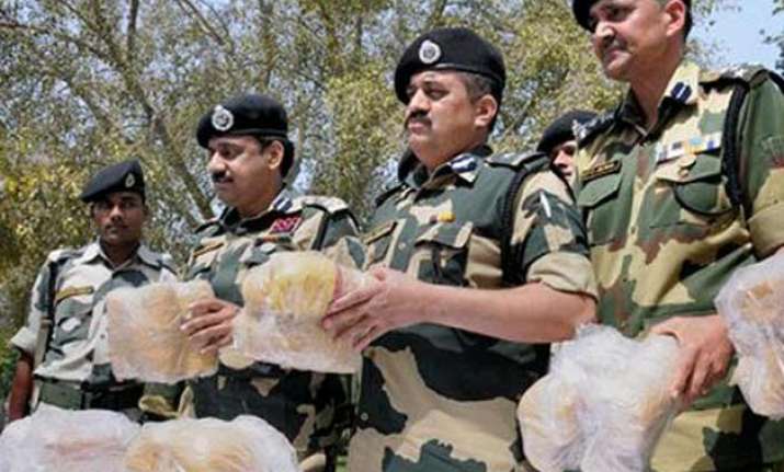 2 pakistan intruders shot dead by bsf 12 kg heroin rifle