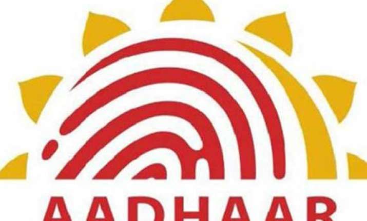 centre to link mobile sim with aadhaar