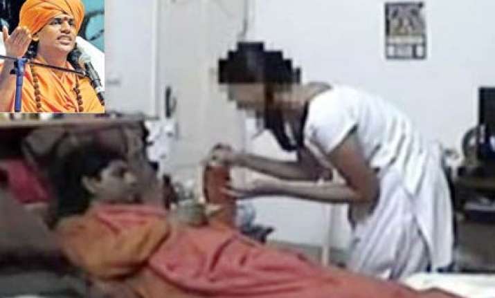 nithyananda devotees demand lodging of fir against lenin