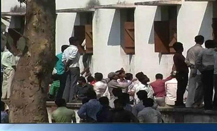 hrd ministry to seek report over cheating in exams in bihar