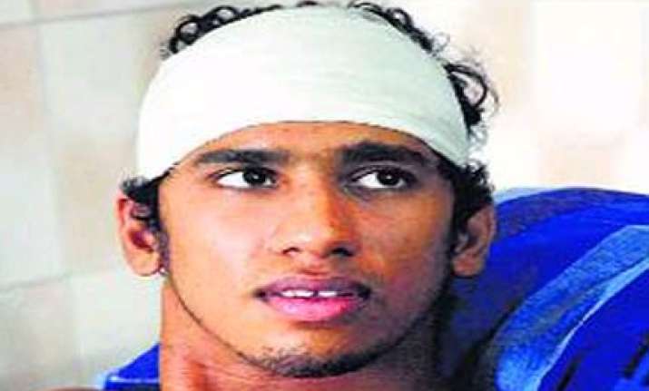 brutally beaten a month ago balakrishnan swam to the semis