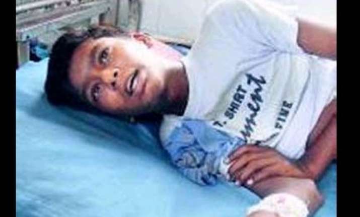 ahmedabad teacher beats up boy for not paying fees