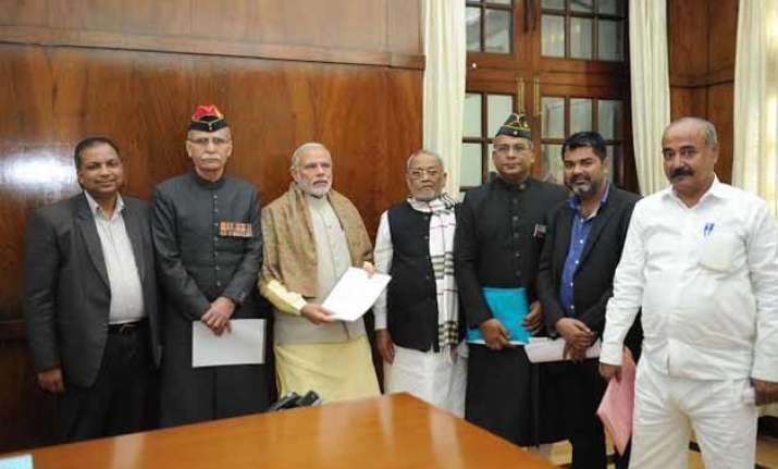 amu vc meets pm modi seeks support on minority status
