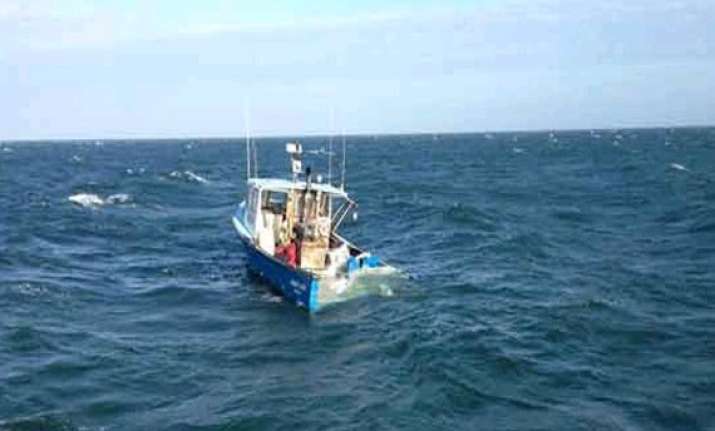 coast guard ships to rescue fishing boats from cyclone