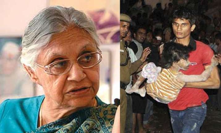 rs 2 lakh to kin of dead in building collapse