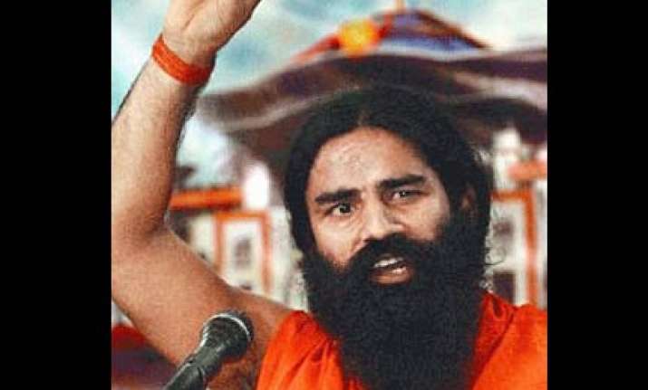 swami ramdev warns of conspiracy to defame hindu saints