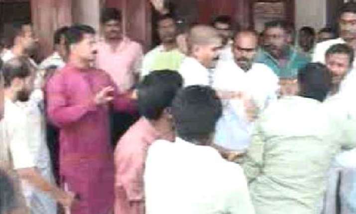 rjd man pulls out pistol on party leader