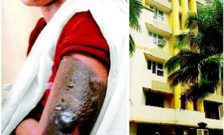 woman scalds maid with hot iron