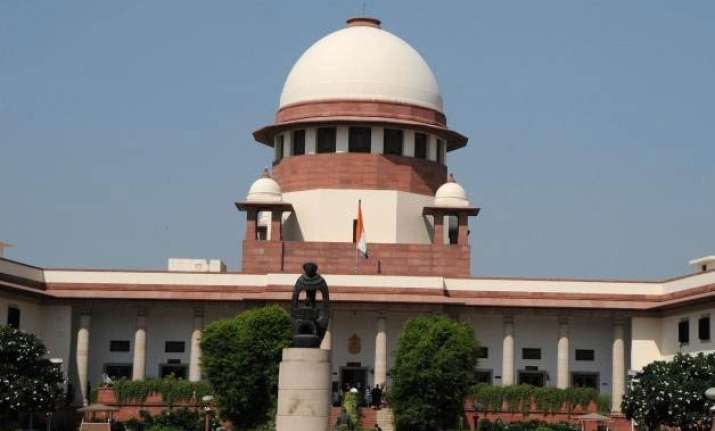 aadhaar row sc assures decision by tomorrow on larger bench
