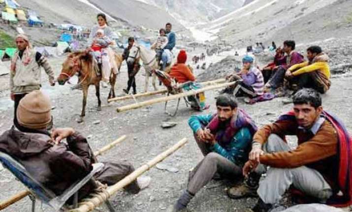 2 dead 10 injured as cloudburst hits amarnath yatra base