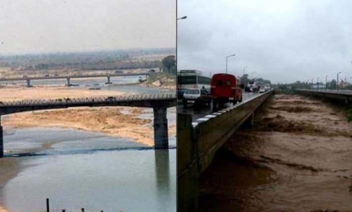 j k floods straight from the tawi bridge jammu