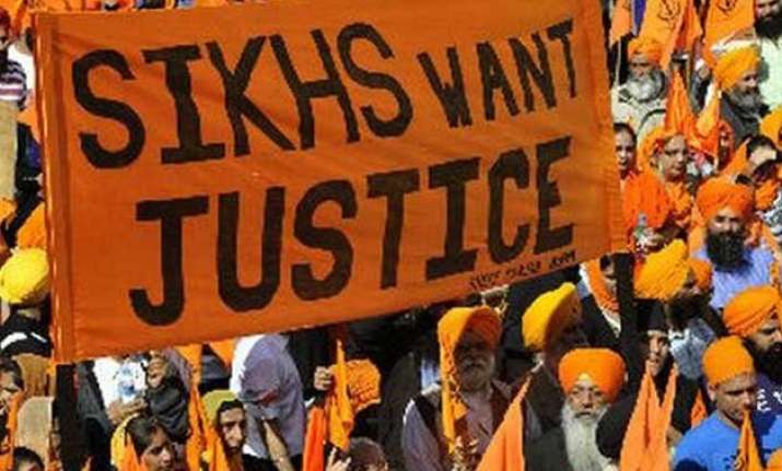 sikh protests continue over granth sahib s desecration