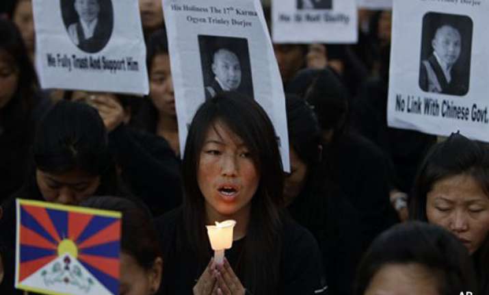 tibetans take out march karmapa says he has faith in indian
