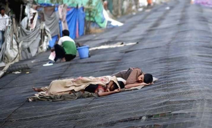 india s poverty rate falls to 12.4 electricity plays big