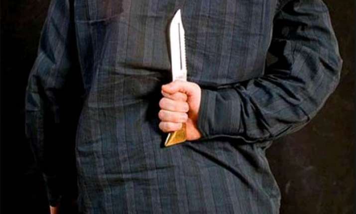 woman kills husband over suspicion of extra marital affair