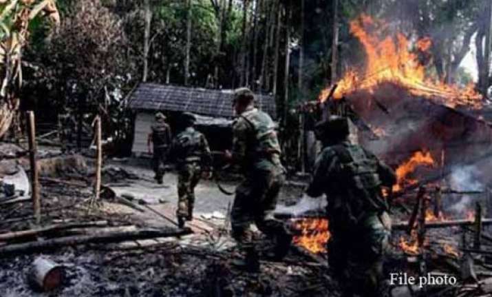 adivasis in assam retaliate kill two bodos torch a village