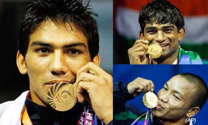 boxers paddlers keep india in hunt for second spot