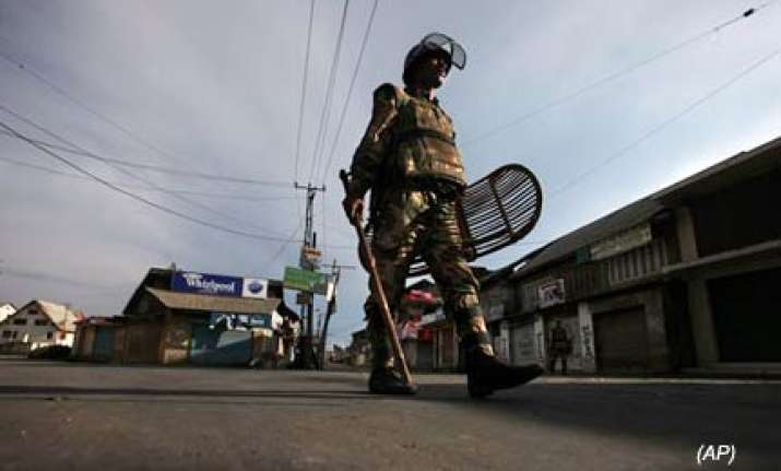 curfew imposed in four districts of kashmir
