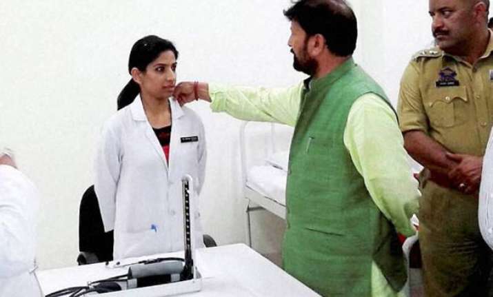 picture of j k bjp minister touching woman doctor s collar