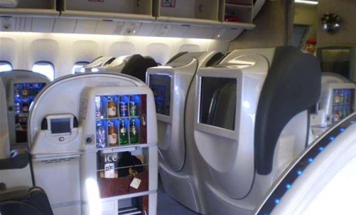 to cut costs government bars first class air travel for