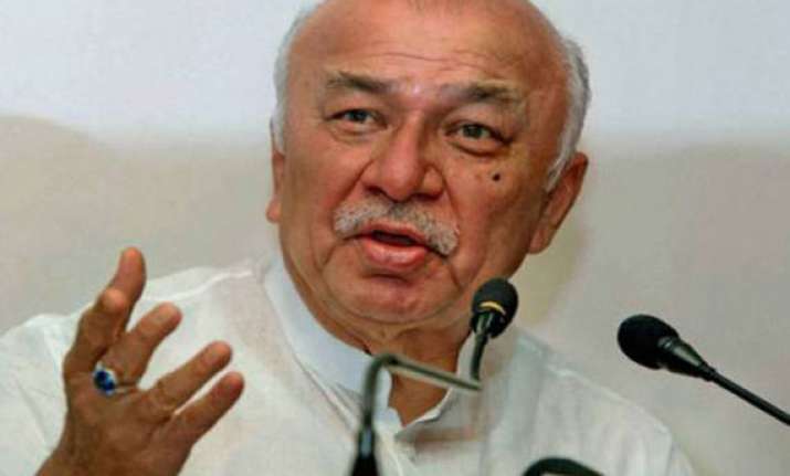 india asks pakistan to defer malik s visit